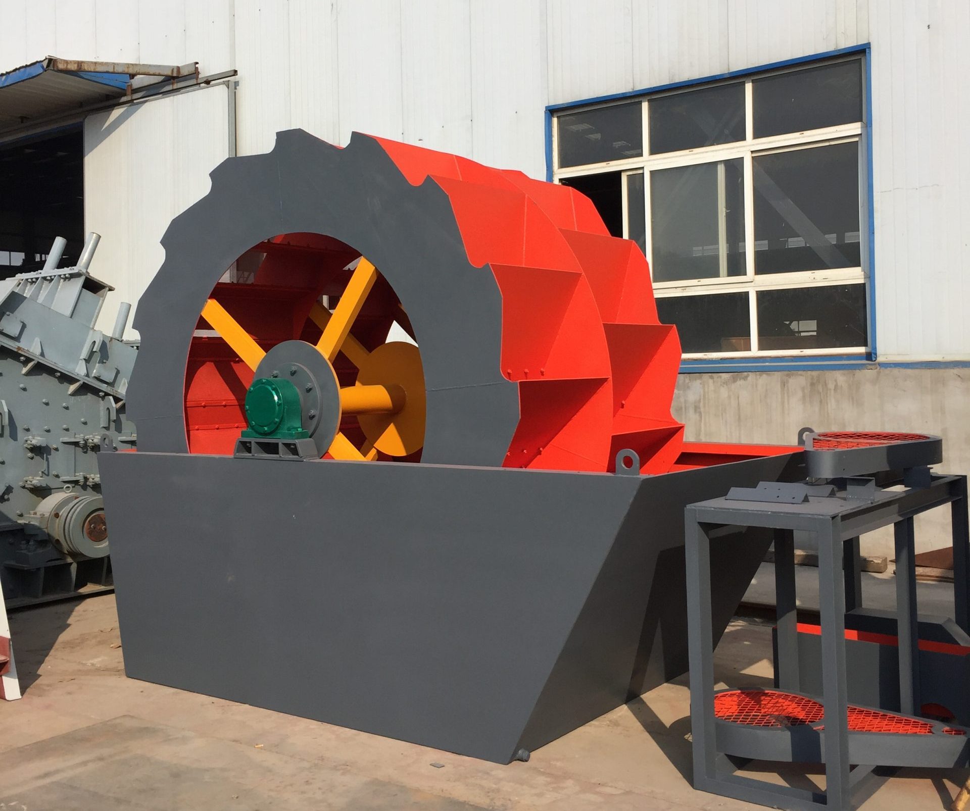 The working principle of the wheel bucket sand washing machinequarry